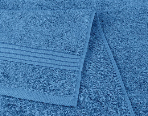 Utopia Towels bathroom scene in electric blue for vibrant bath decor
