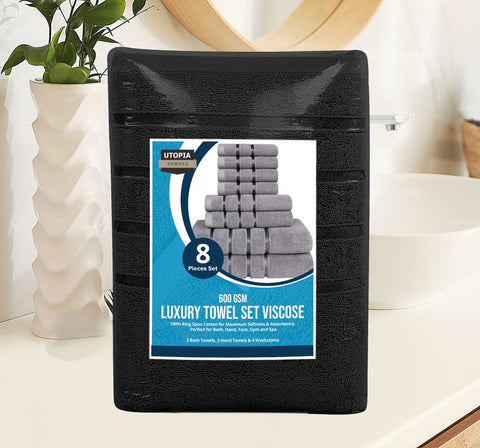Utopia Towels bathroom setup featuring a luxury black towel set.
