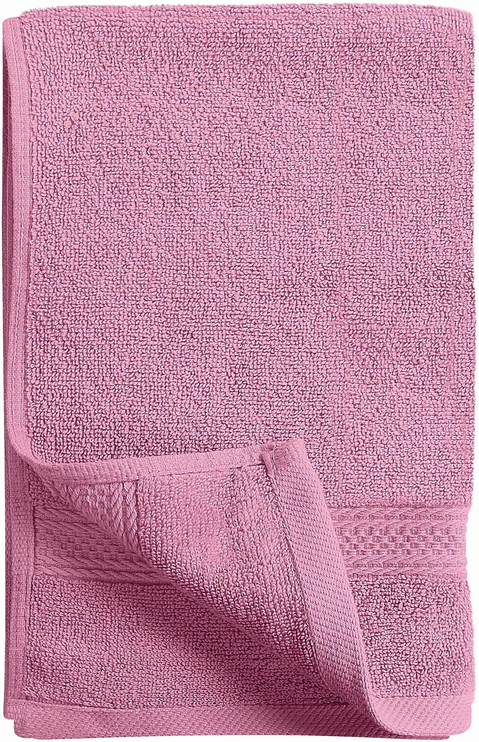 Utopia Towels bathroom lifestyle image featuring plush towels in a spa-like setting.