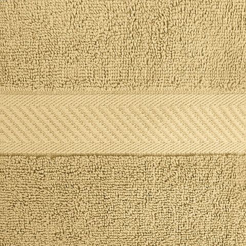 Utopia Towels beige tone in a bathroom setup for calm decor and luxury feel.