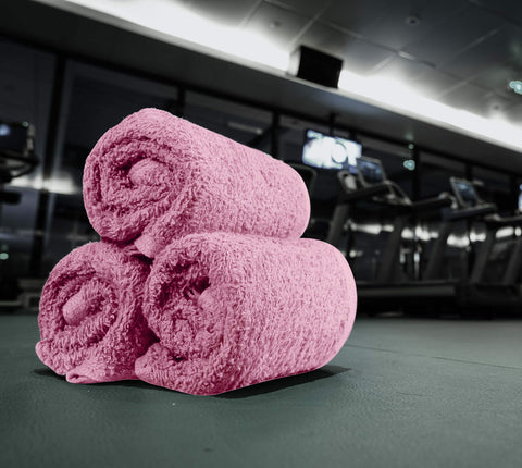 Utopia Towels plush pink washcloths brighten guest spaces while delivering everyday comfort.