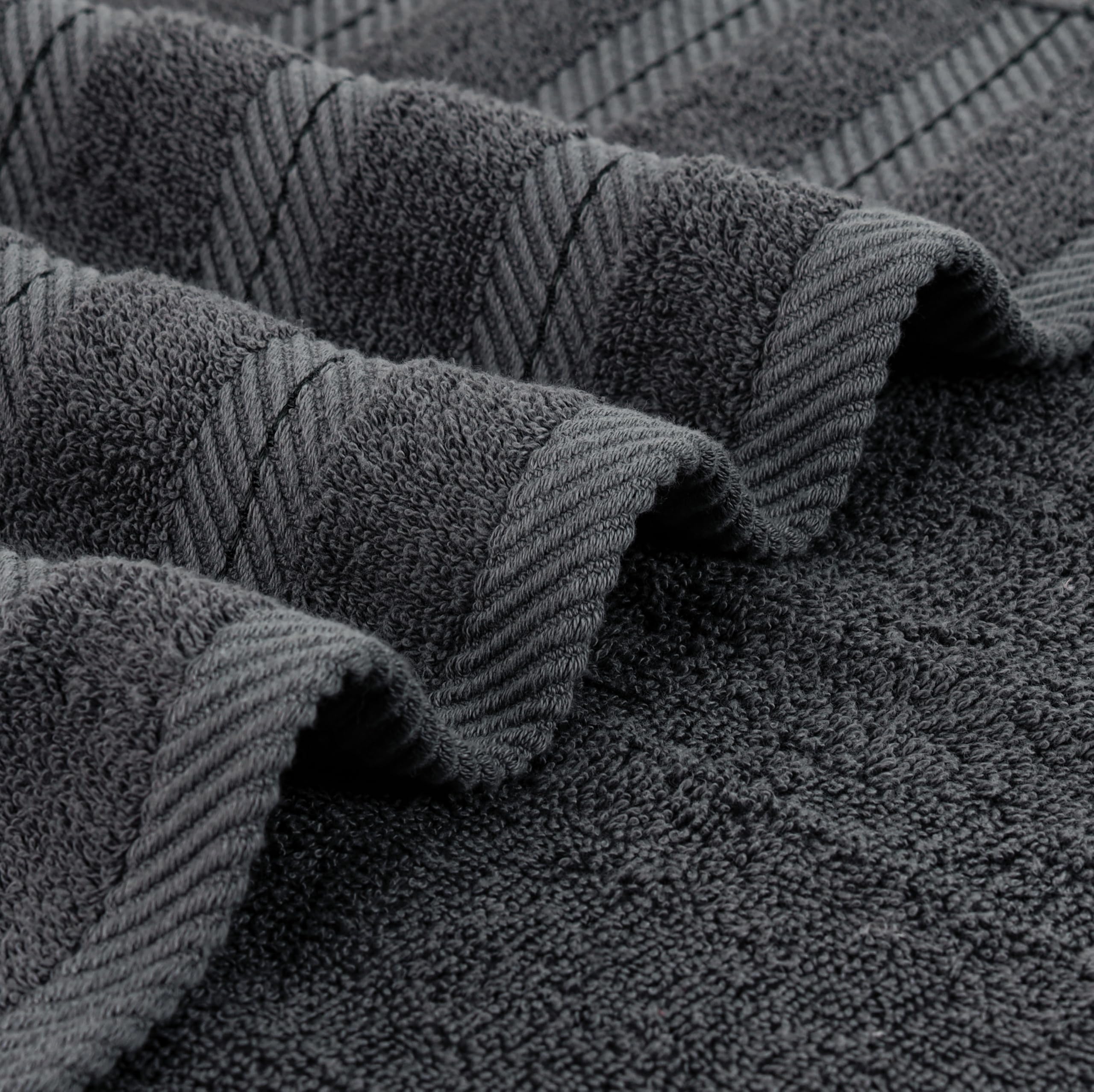 Grey towel demonstrating color-fast performance after washing.