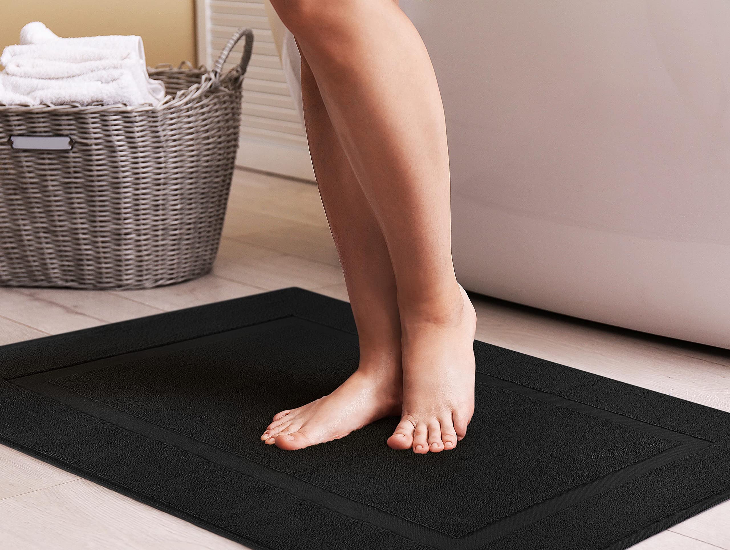 Utopia Towels absorbent rug soaks moisture quickly for a dry bathroom floor.