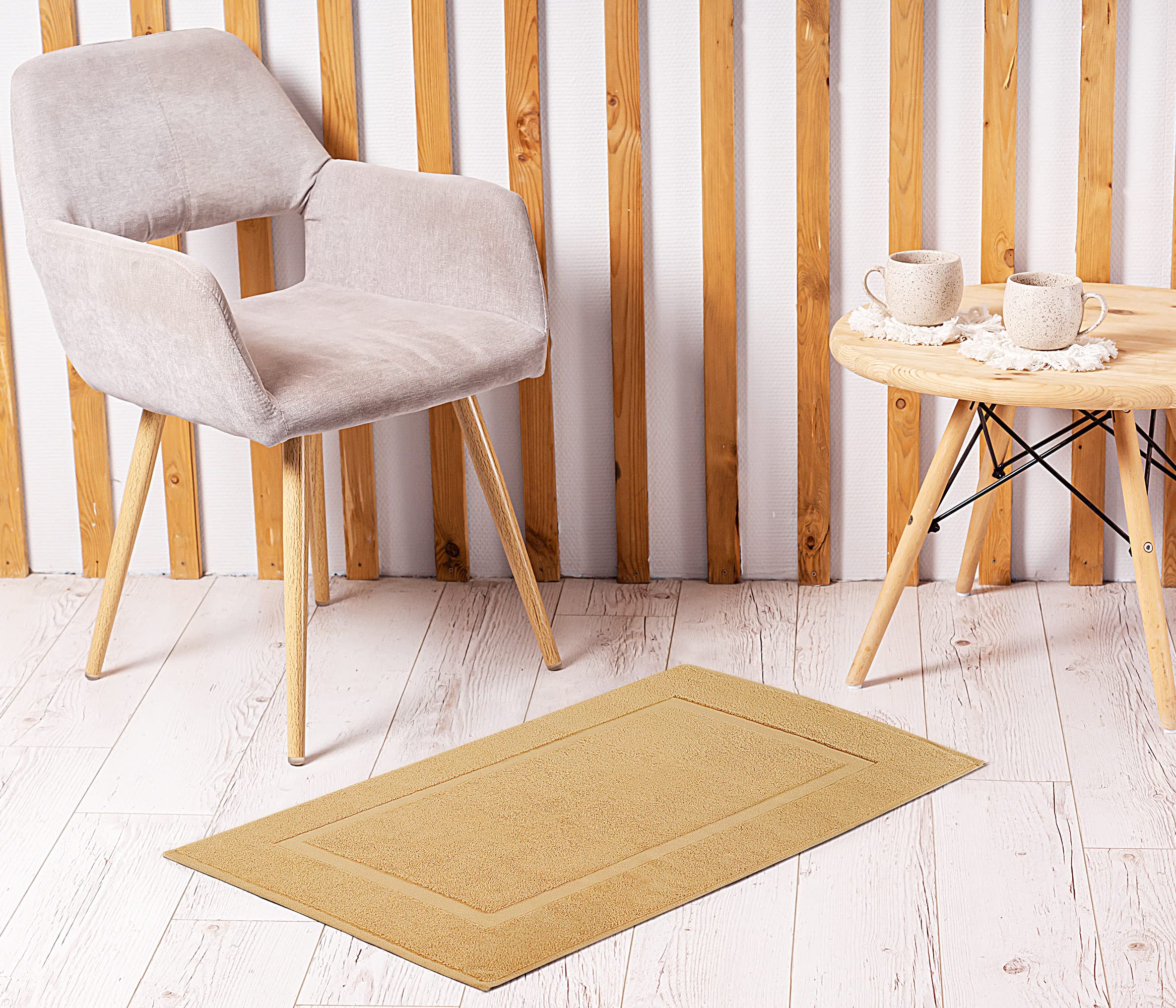 Utopia Towels 100% cotton rug delivers plush underfoot comfort.