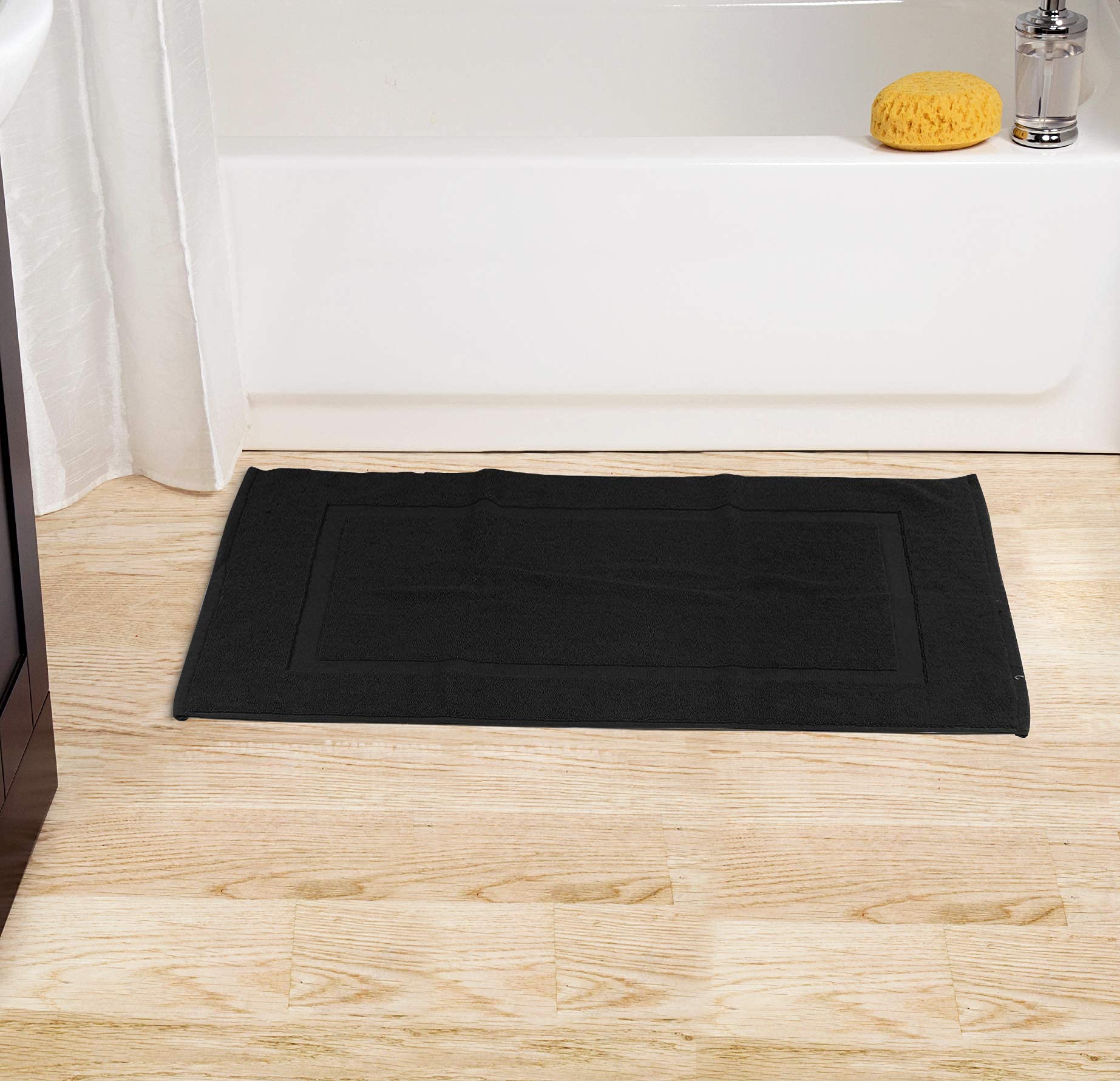 Utopia Towels 2-pack bath mats offer practical, neutral white styling for any bathroom.