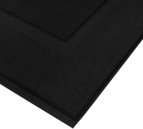 Utopia Towels two-sided rug demonstrates flip-ready design for extended freshness.