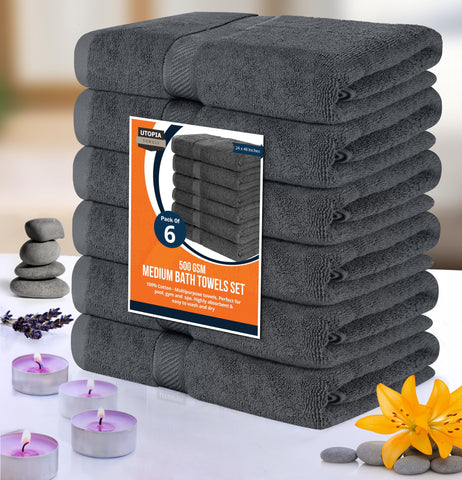 Utopia Towels grey towels in view emphasize modern bathroom decor and versatility