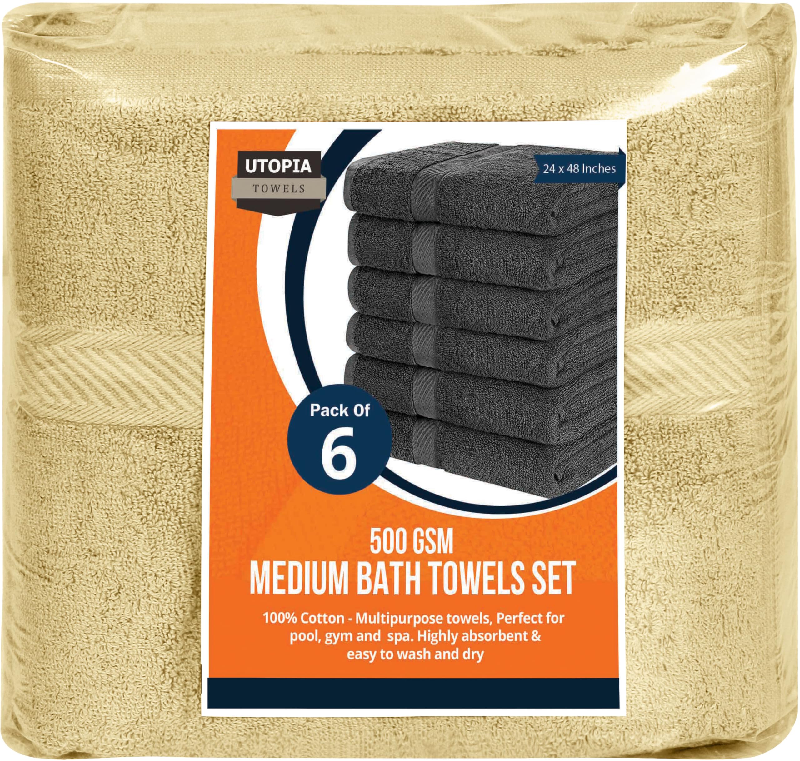 Utopia Towels guest room setup with premium beige towels ready for guests.