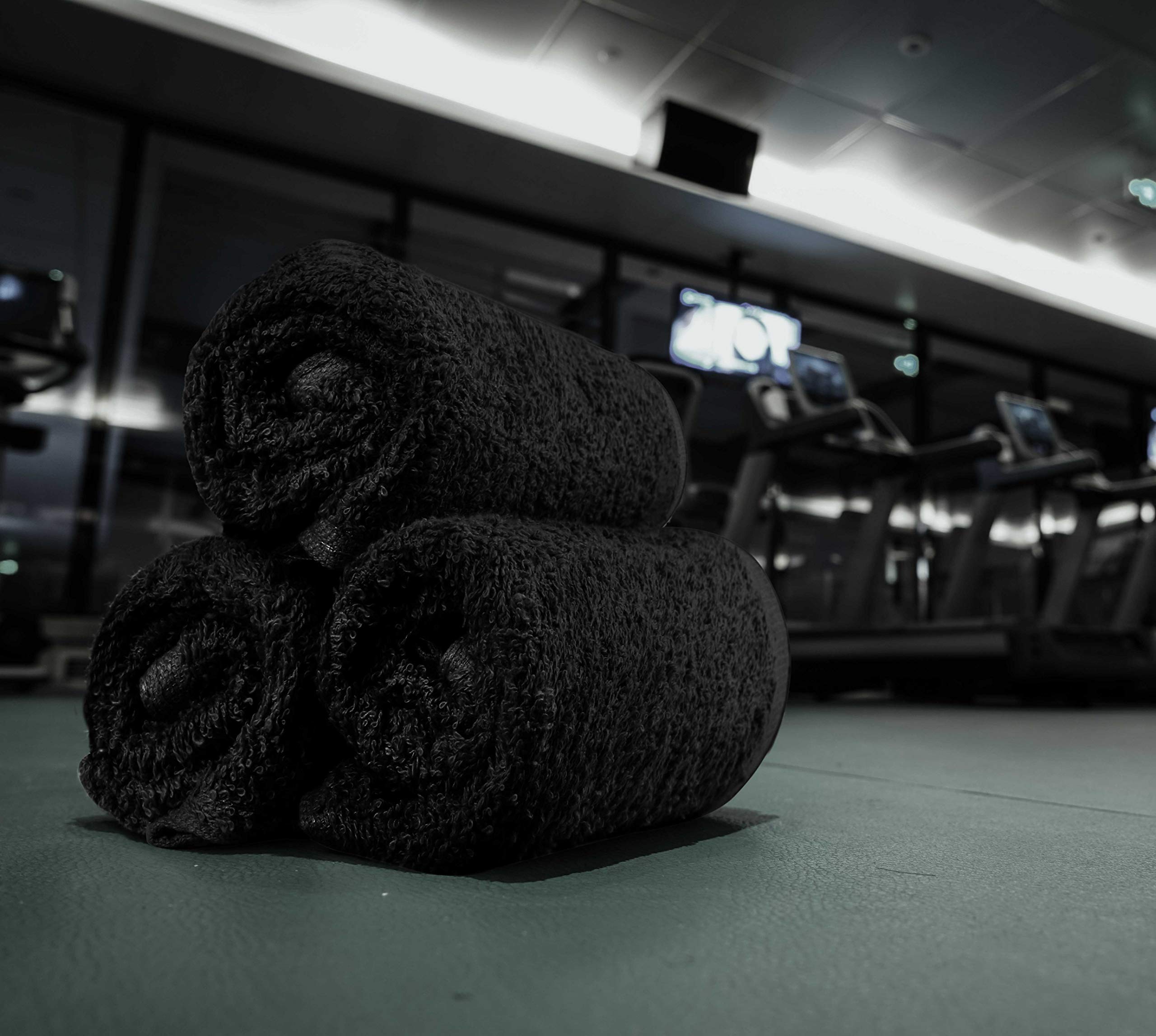 Utopia Towels gym spa pool-use showing versatile towel for workouts.