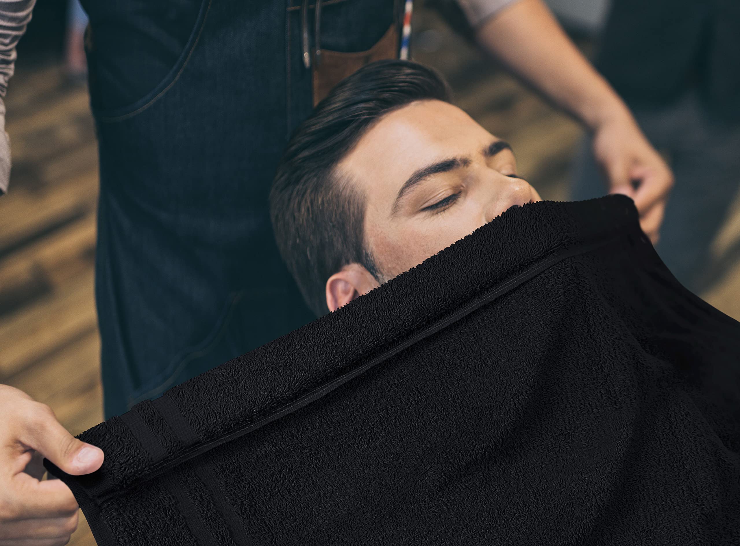 Utopia Towels hair-color wrap towel supports shoulder coverage during treatments.