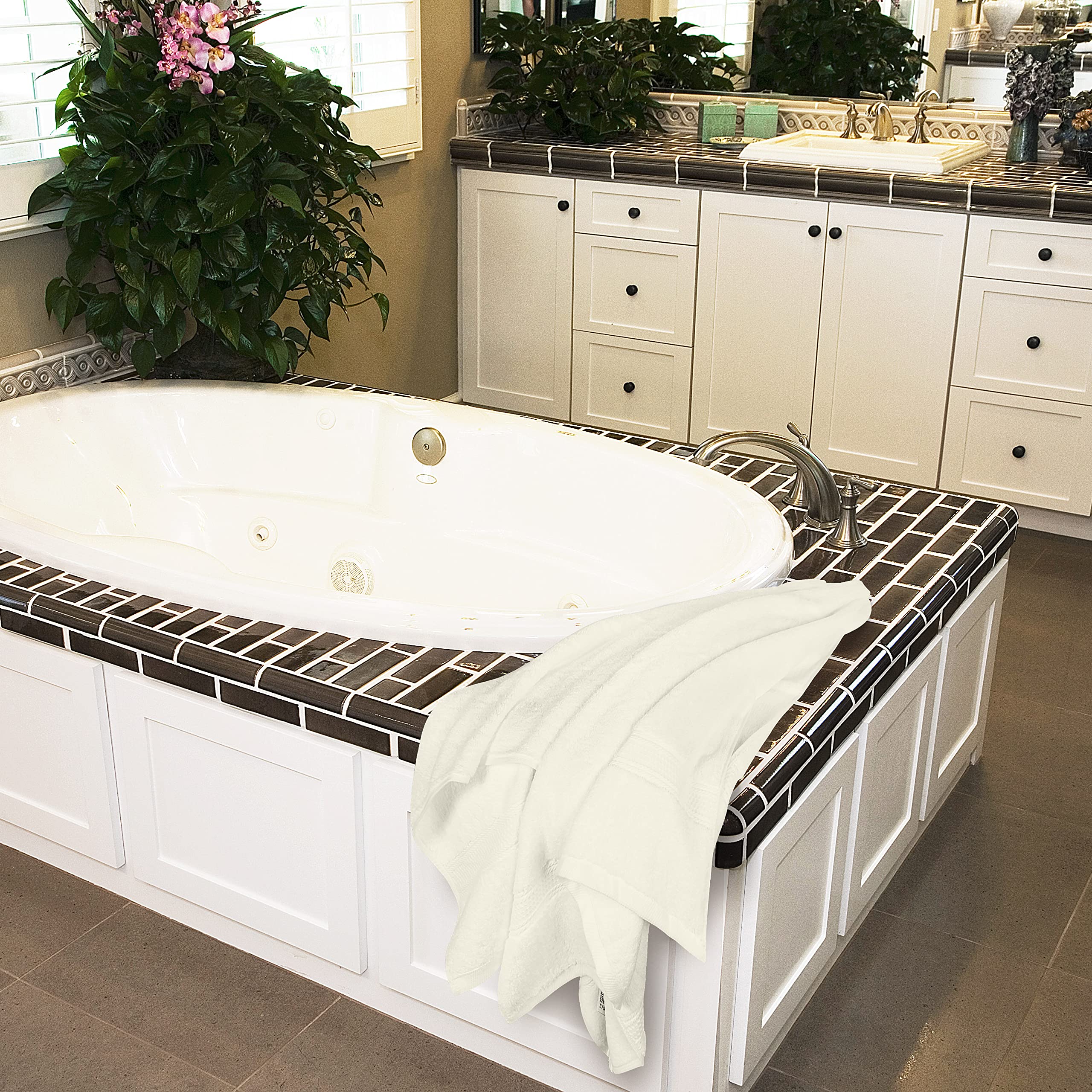 Utopia Towels towels hanging in a bathroom for easy access