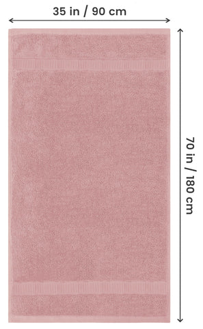 Utopia Towels Luxurious Jumbo Bath Sheet draped on model demonstrates generous coverage for post shower comfort.