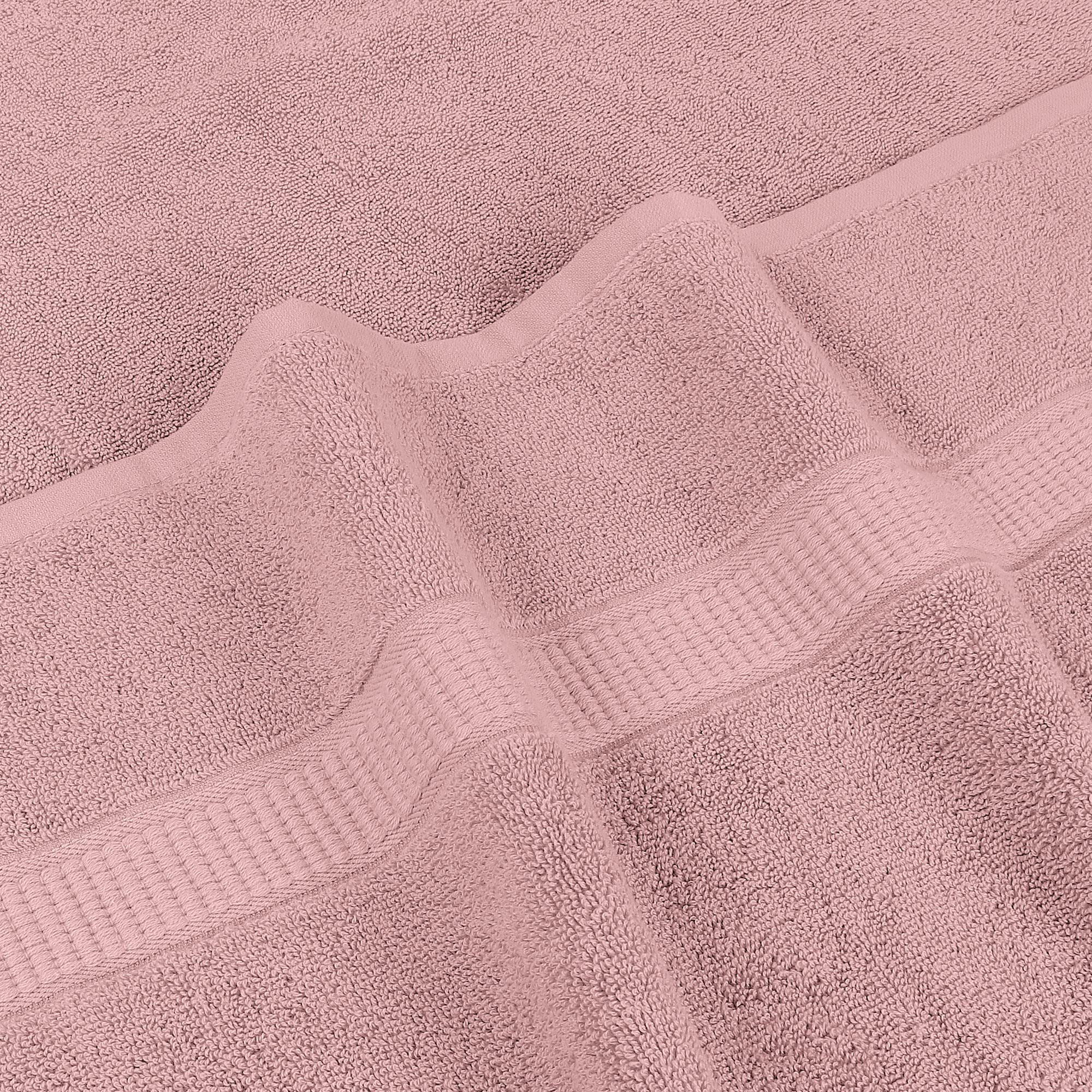 Utopia Towels Luxurious Jumbo Bath Sheet soft touch image conveys plush comfort after showers.