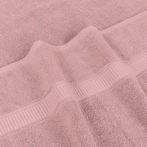 Utopia Towels Luxurious Jumbo Bath Sheet soft touch image conveys plush comfort after showers.