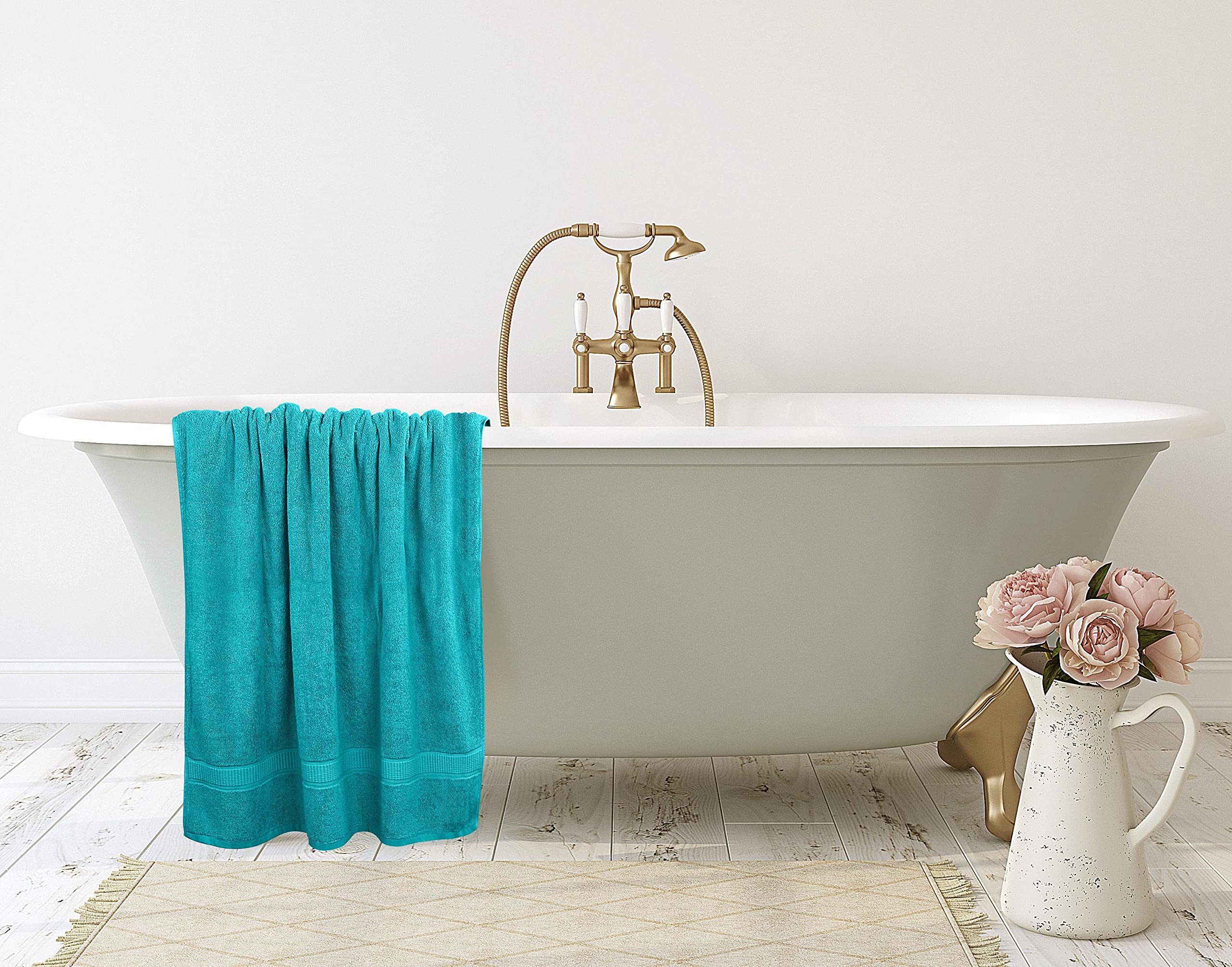 Gift-ready packaging of Utopia Towels bath sheet with turquoise hue.