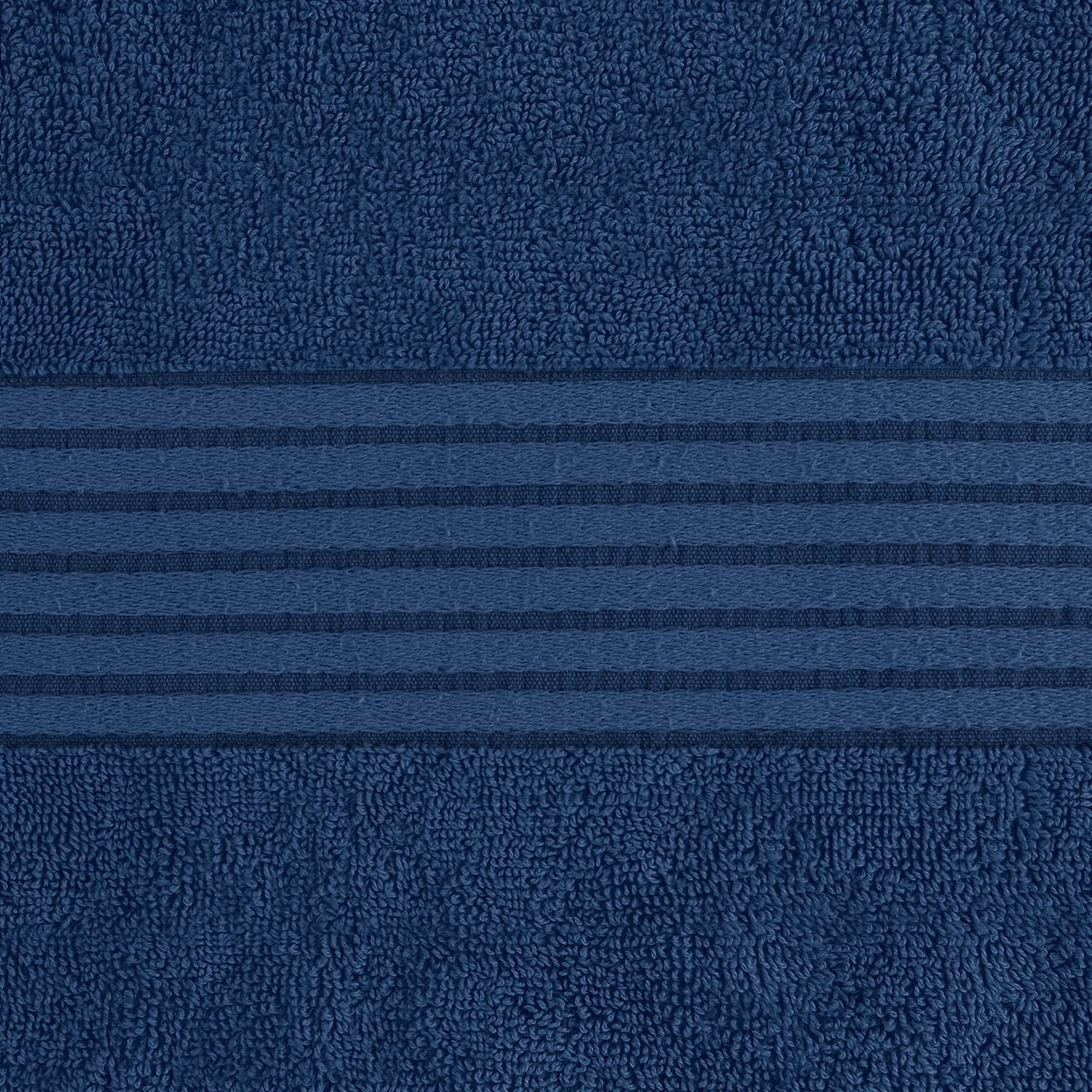 Utopia Towels navy towels flat lay highlighting generous size.