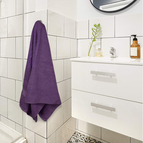 Utopia Towels plum towel adding a rich color to bathroom decor.