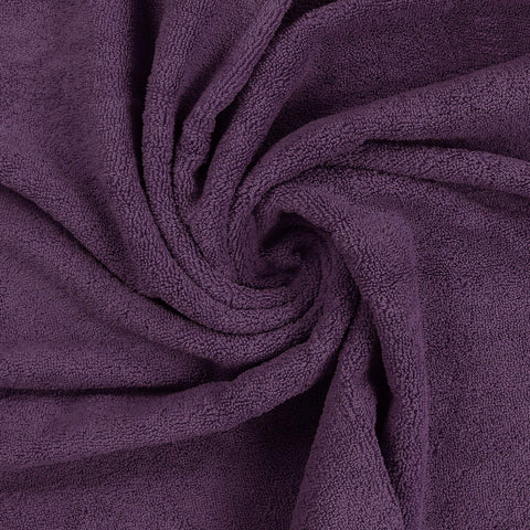 Utopia Towels plum towel set in a bathroom accenting hotel-style luxury