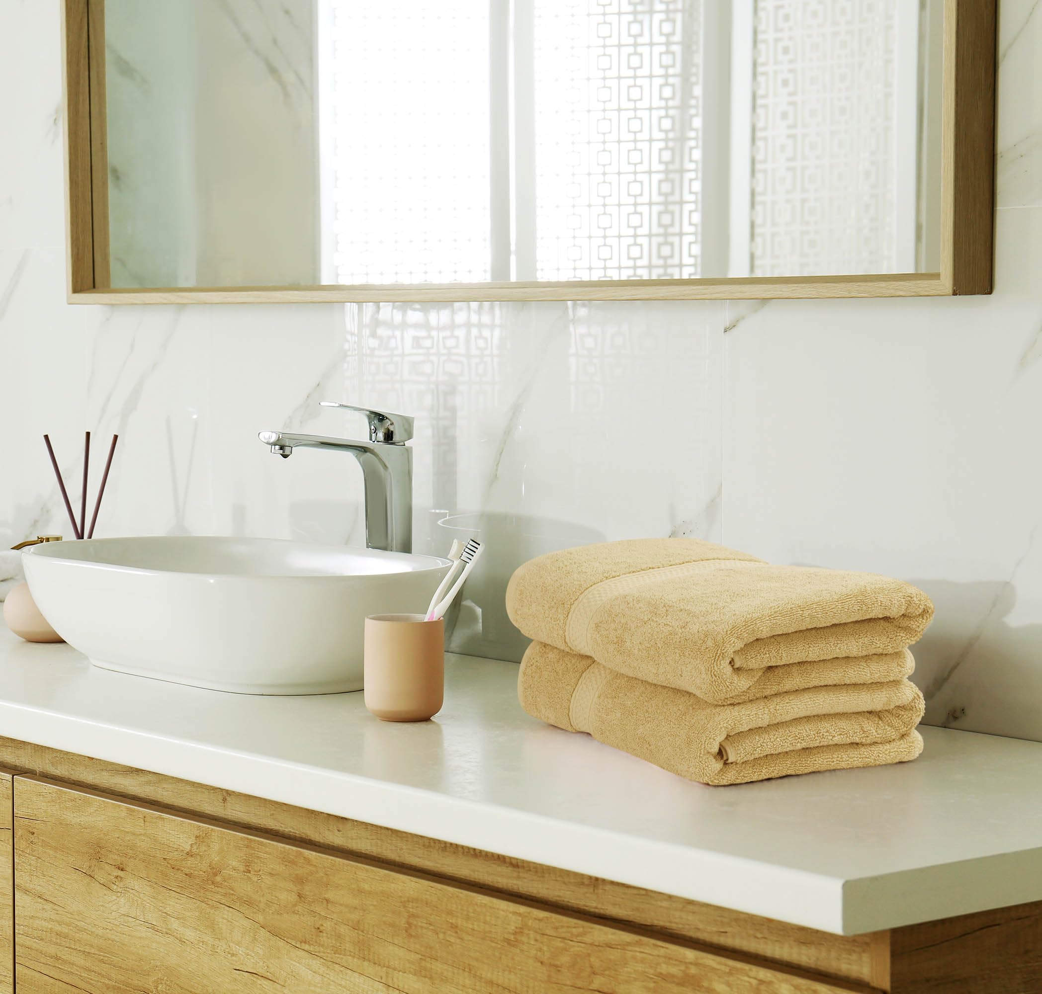 Utopia Towels spa-like drying scene, plush fibers for a comfortable finish.