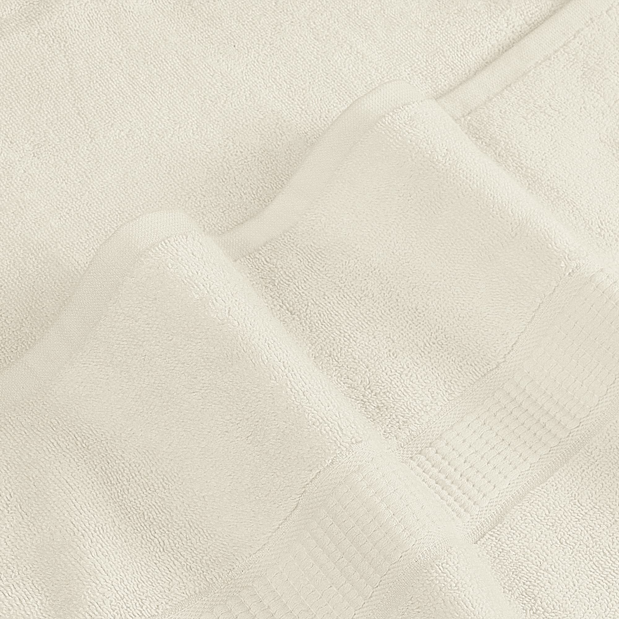 Utopia Towels care label indicates machine wash and low-heat drying.