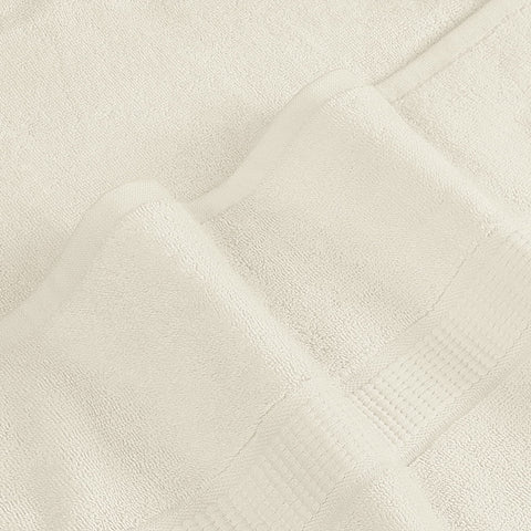 Utopia Towels care label indicates machine wash and low-heat drying.