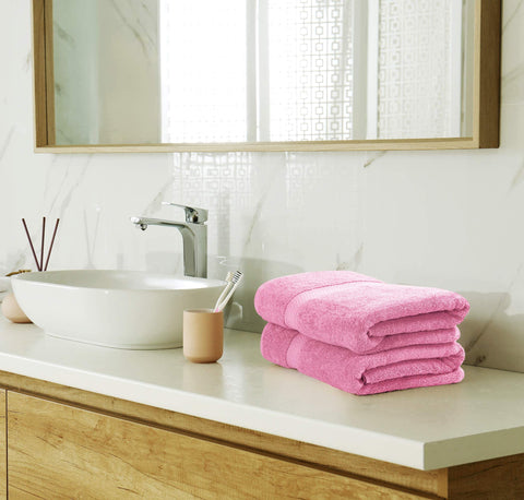Utopia Towels washcloth pink laid flat showing even stitching and premium quality.
