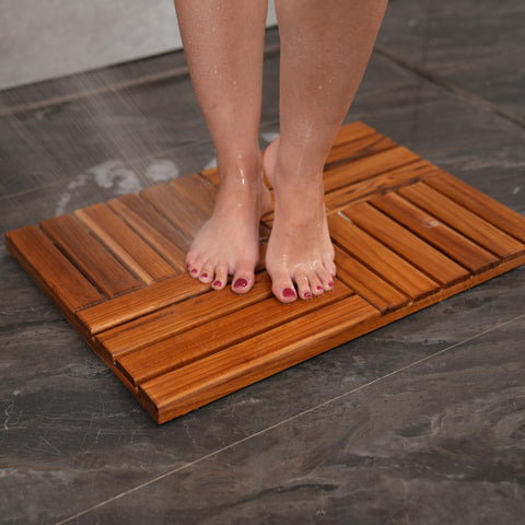 Utoplike teak bath mat chamfered edges provide barefoot comfort.