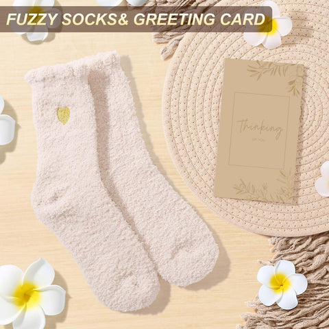 Uwingess thinking of you card accompanies the gift with care.