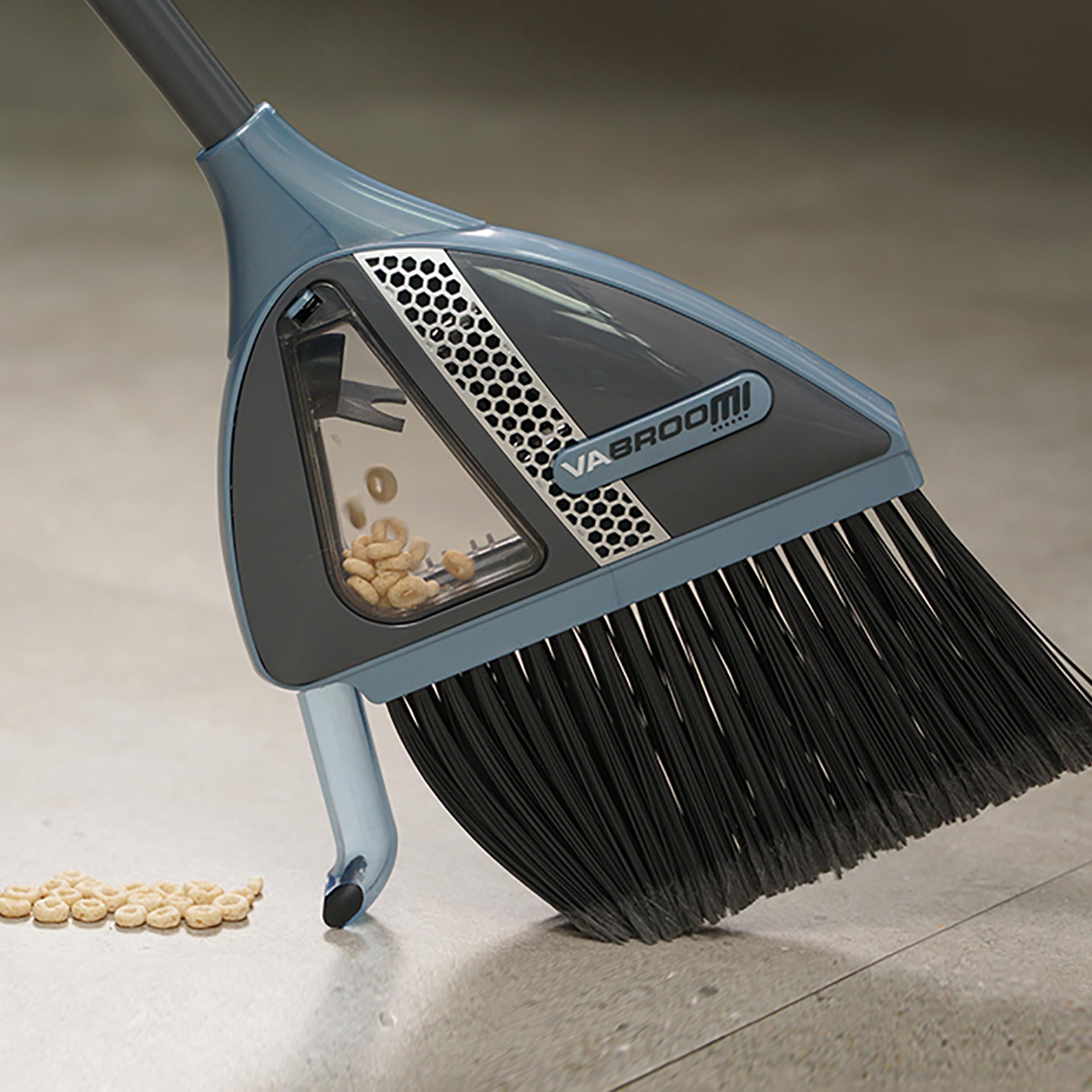 VaBroom hard-floor sweeper head gliding smoothly over wood and tile