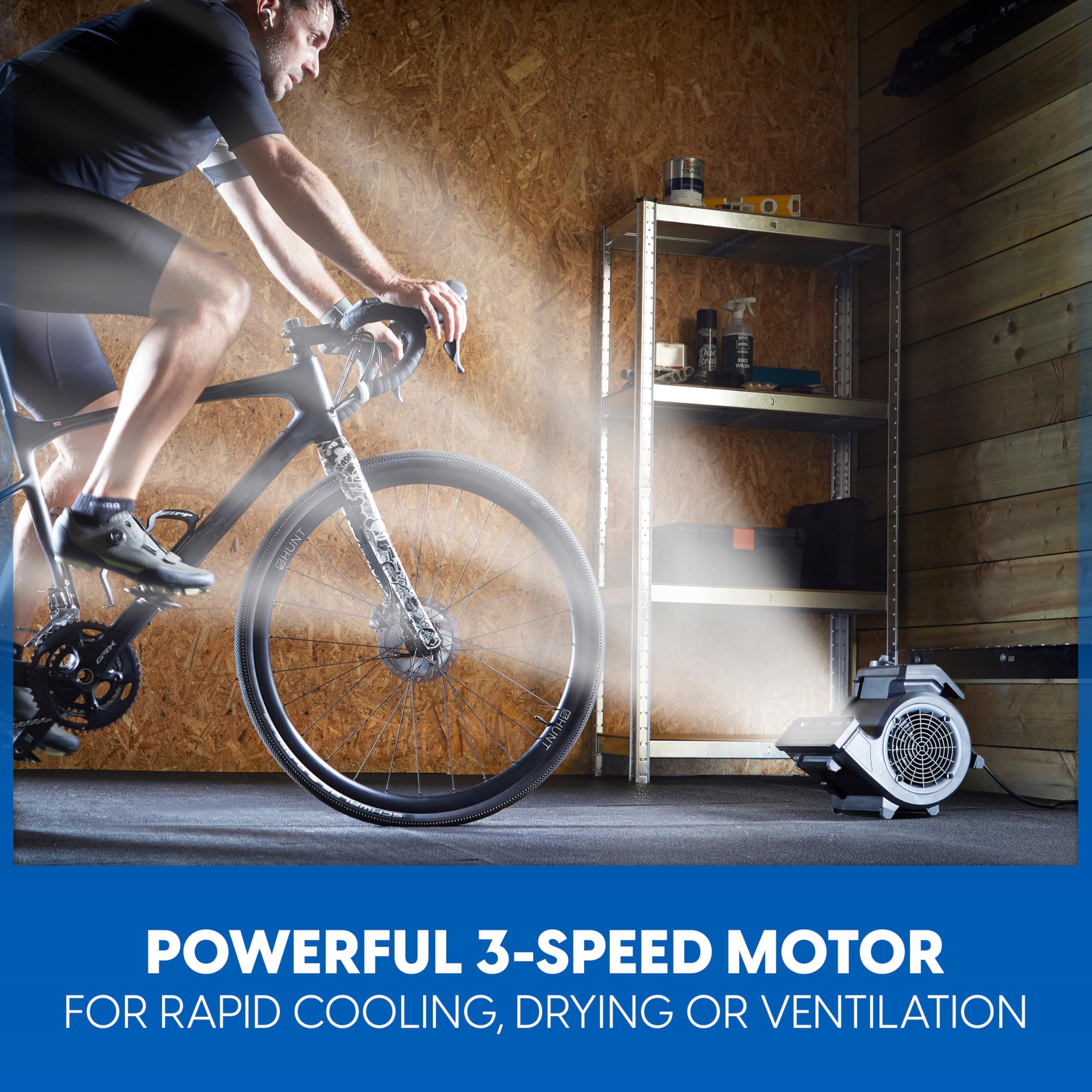 Vacmaster AM201R remote control strapped for hands-free speed adjustments.