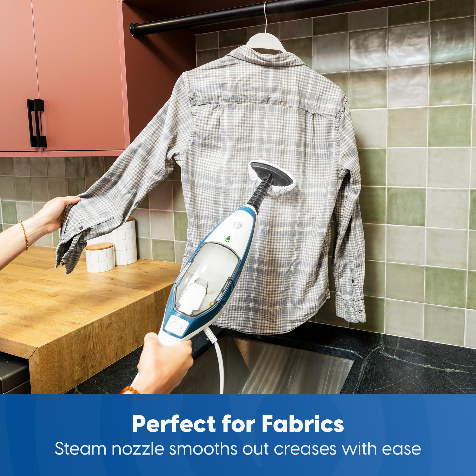 Vacmaster SMF1501 used on tiles and glass surfaces for precise cleaning.