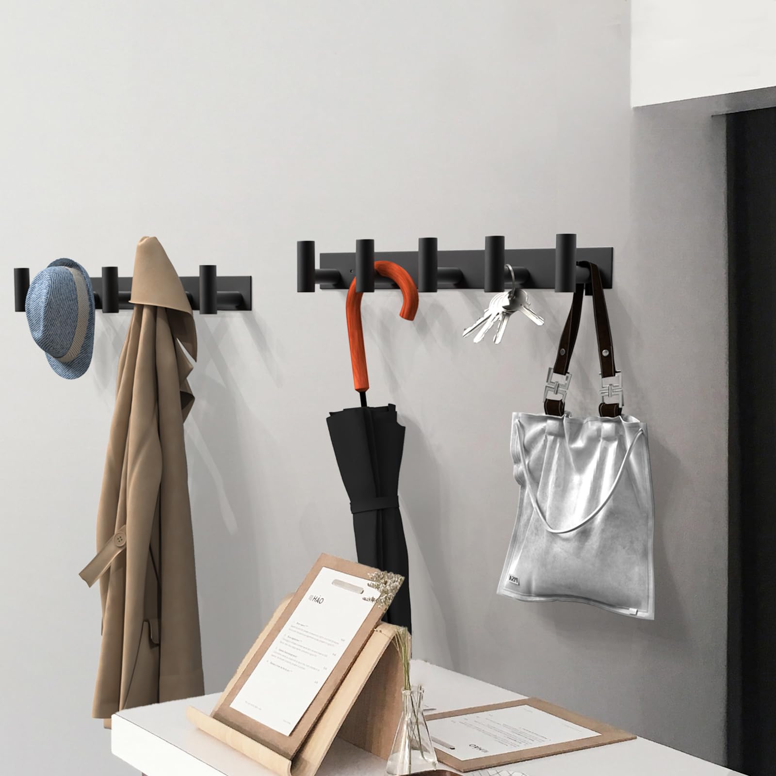 VAEHOLD entryway with keys and hats on dual-row hooks.