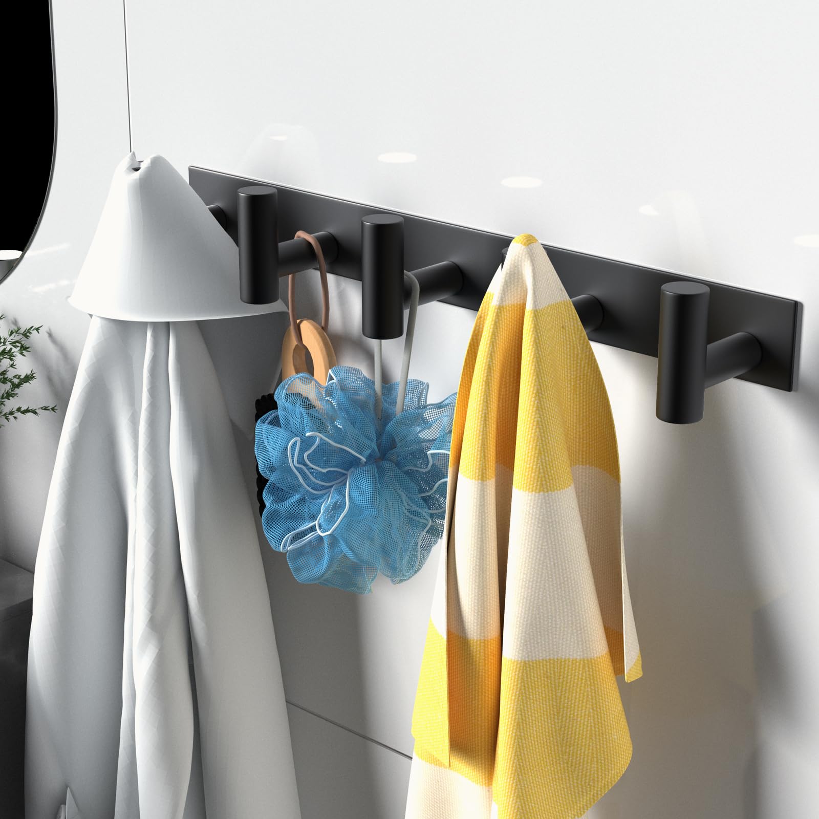 VAEHOLD coat rack installed on a door, quick and clean setup.