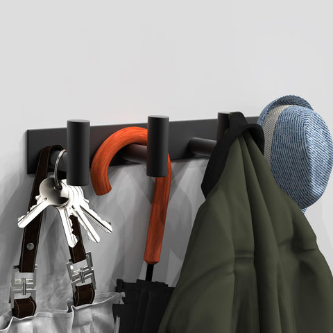 VAEHOLD wall hooks close-up showing anti-slip design for secure towels and garments