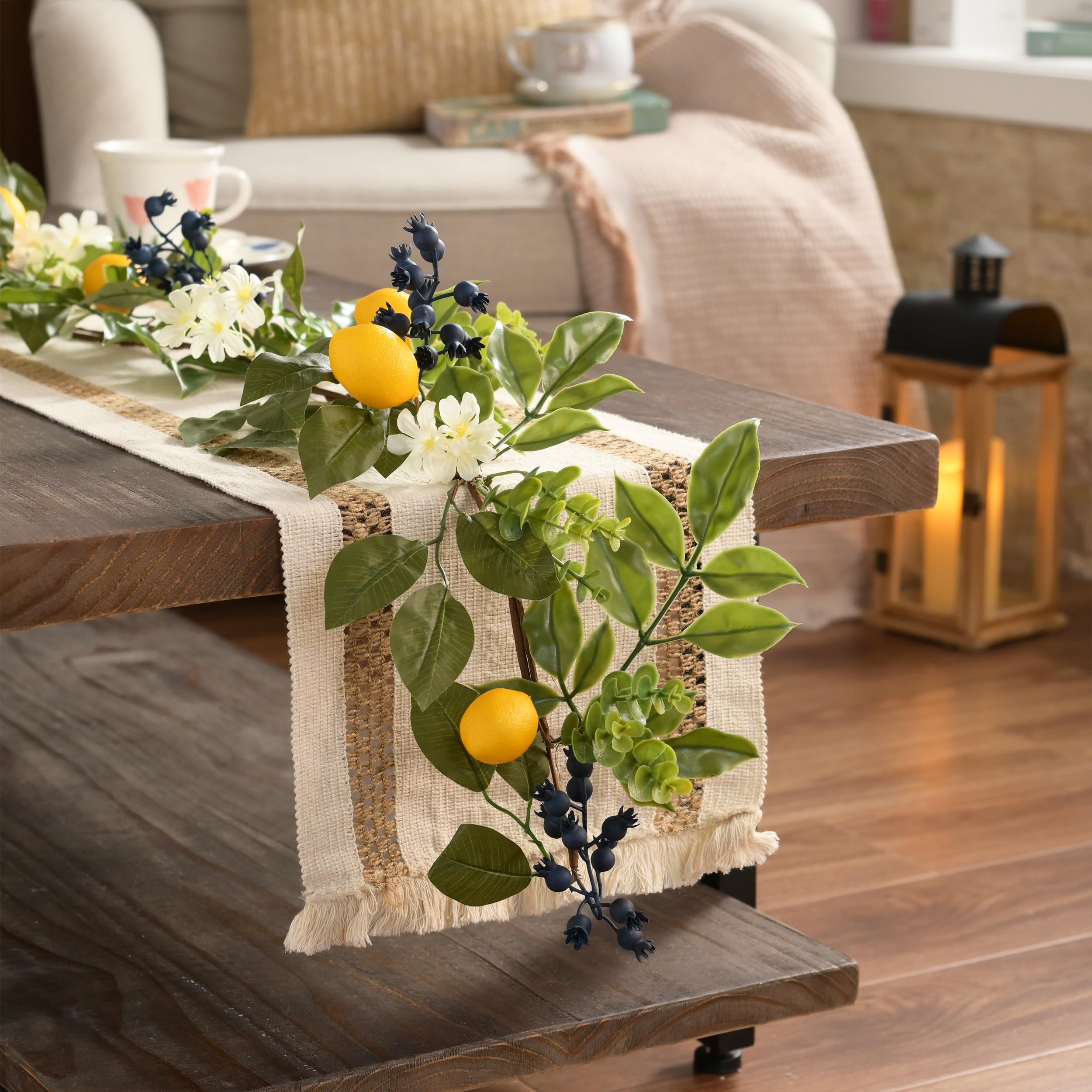 Battery-powered warm white LEDs illuminate lemons and berries for cozy evenings.