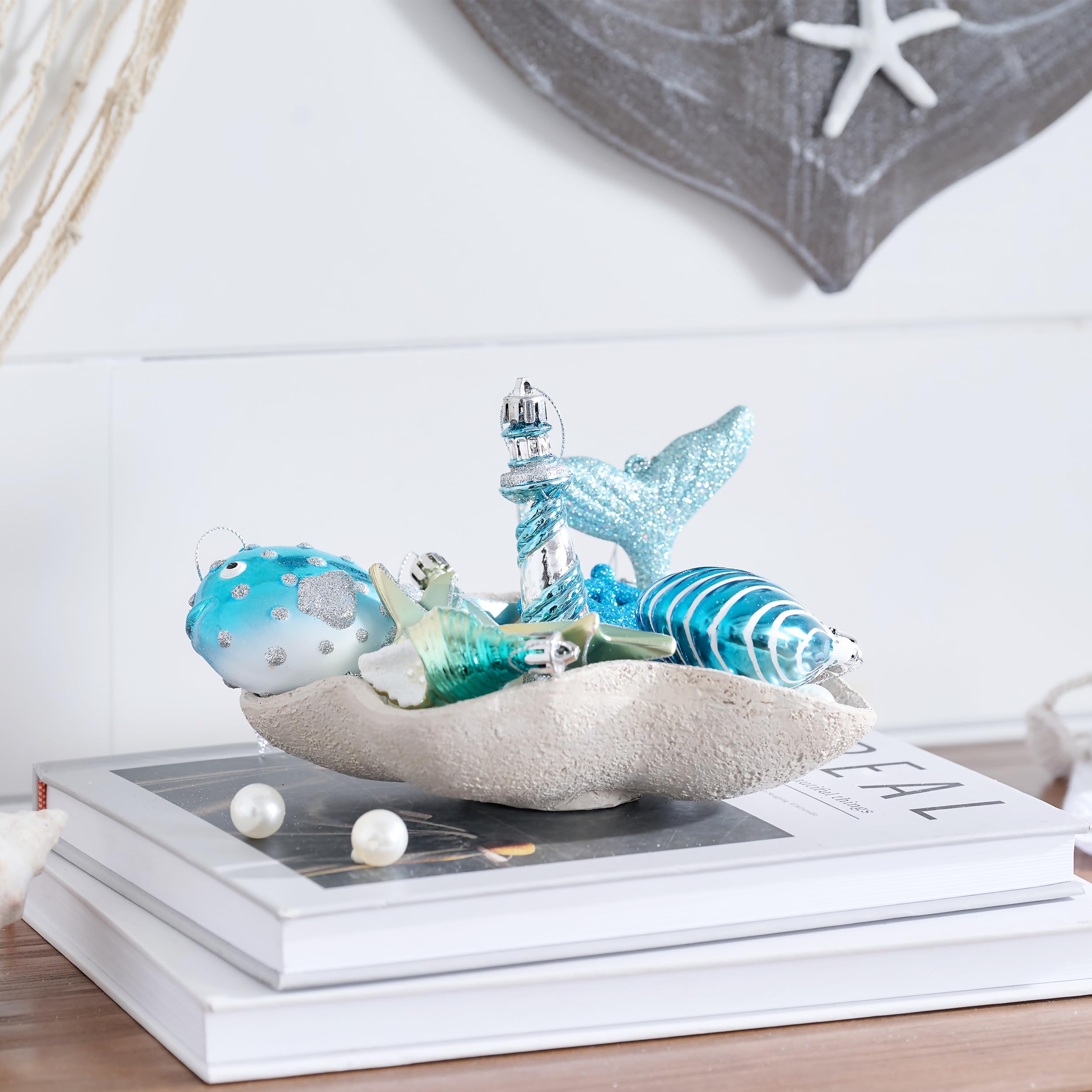 Valery Madelyn conch shell ornament with pearl finish for seaside elegance.
