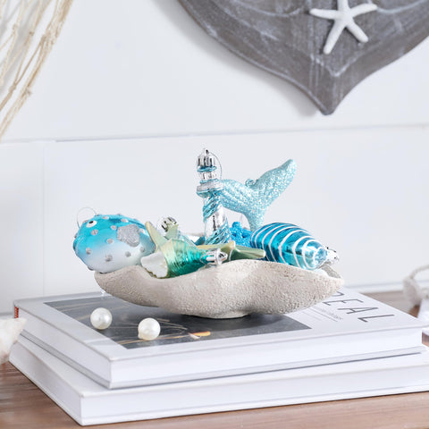 Valery Madelyn conch shell ornament with pearl finish for seaside elegance.