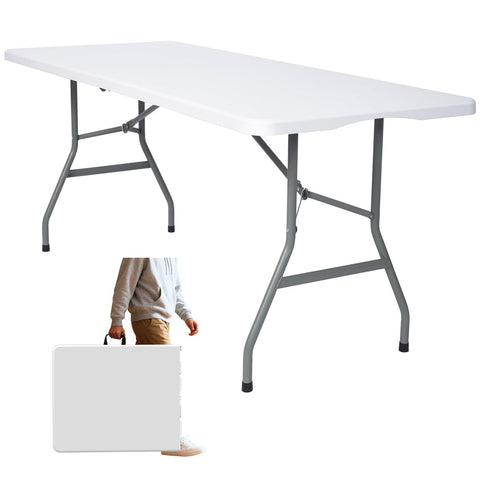 Vampire Killer 6ft folding table being set up for outdoor gathering.