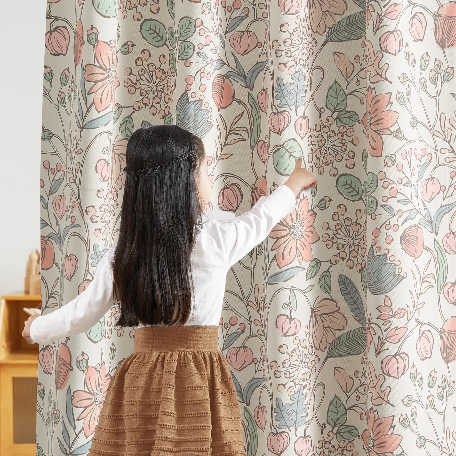 Vangao pink nursery curtains feature floral design and 63-inch length for full coverage.