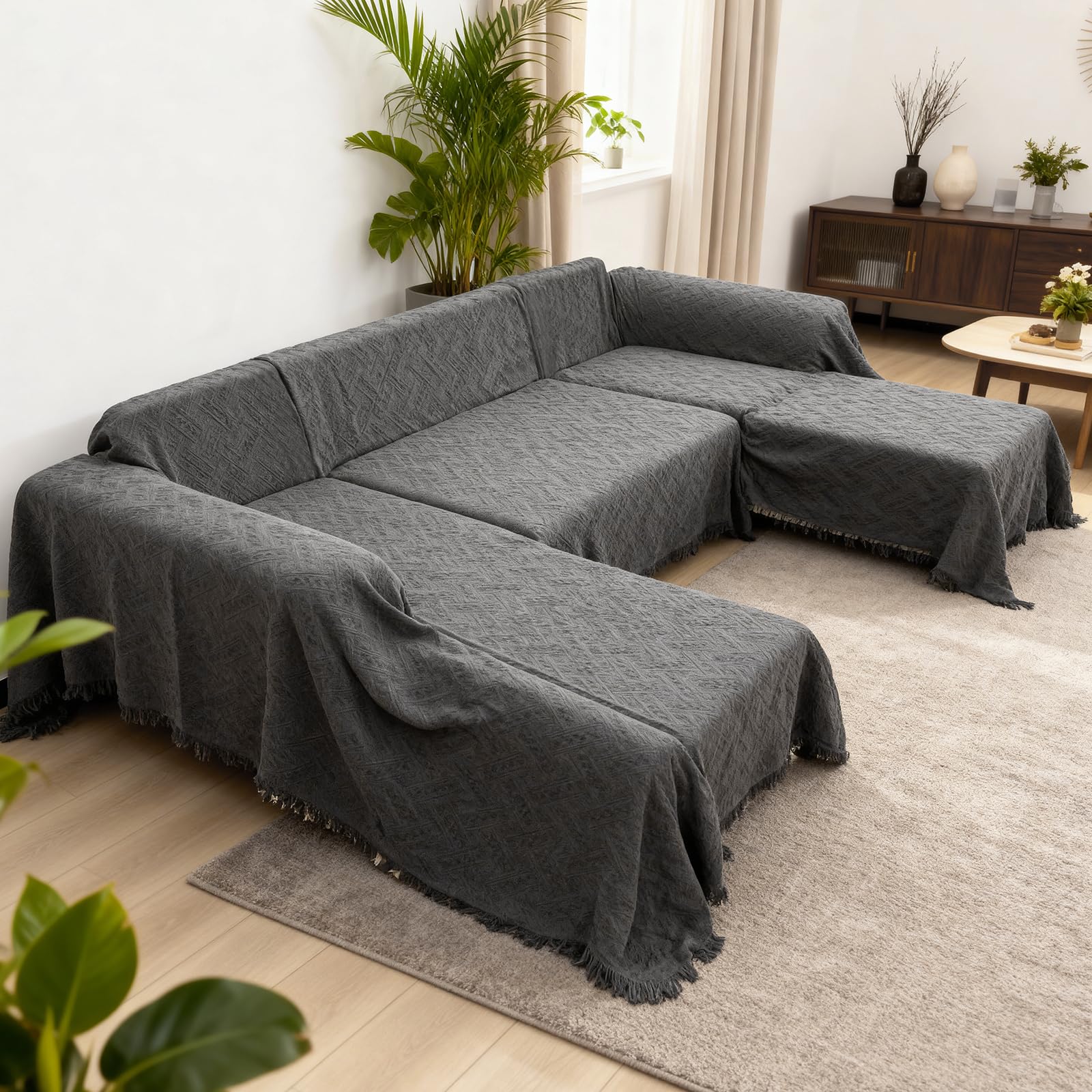 VANITURE versatile couch cover used as a throw or picnic blanket.