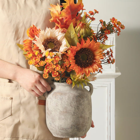 Vanselia ceramic flower vase as a dining room centerpiece with seasonal stems.