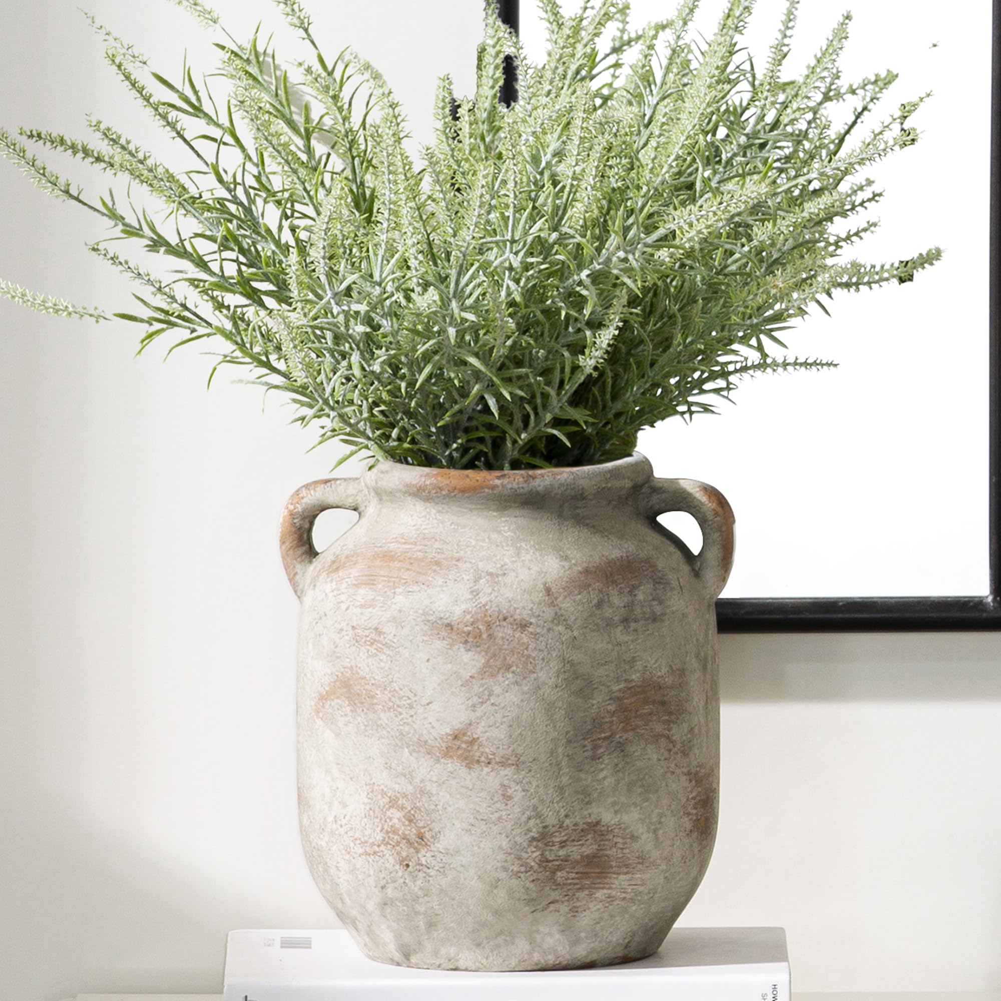 Vanselia ceramic flower vase with handle, ideal for a table centerpiece with fresh blooms.