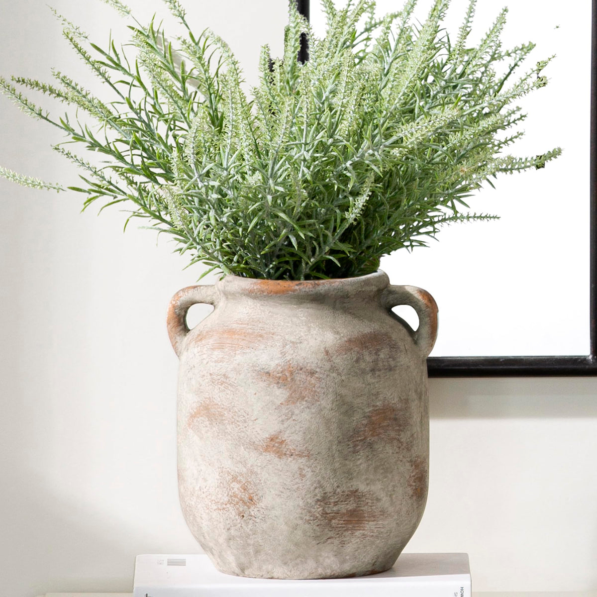 Vanselia ceramic flower vase with handle, ideal for a table centerpiece with fresh blooms.