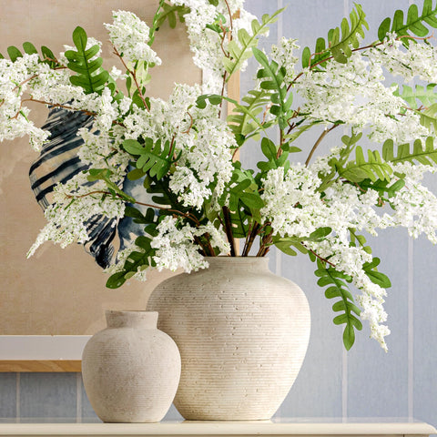 Vanselia vase base with non-slip pad protects furniture.