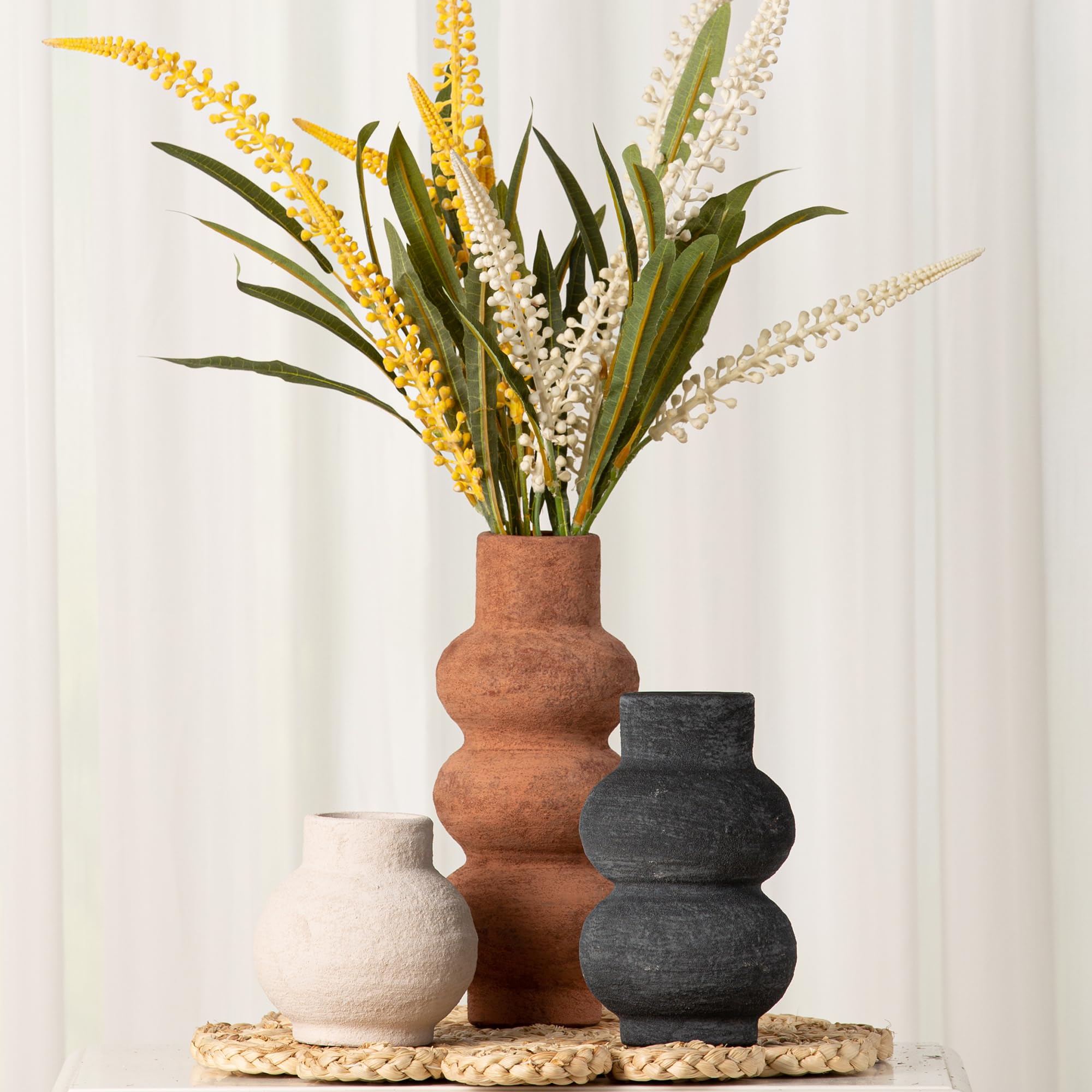 Vanselia trio display ready as versatile dining or coffee table centerpiece.
