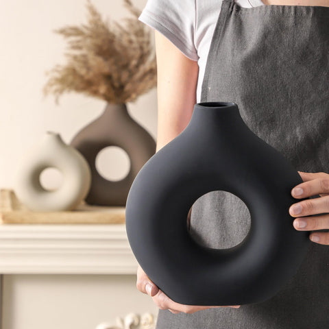 Vanselia handcrafted ceramic vase, durable and stable on surfaces.