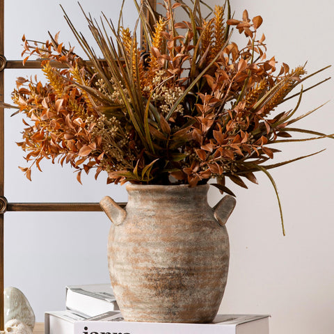 Living room setup featuring Vanselia ceramic vase on coffee table.