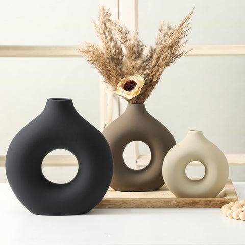 Vanselia set of 3 vases creates versatile centerpieces for dining.