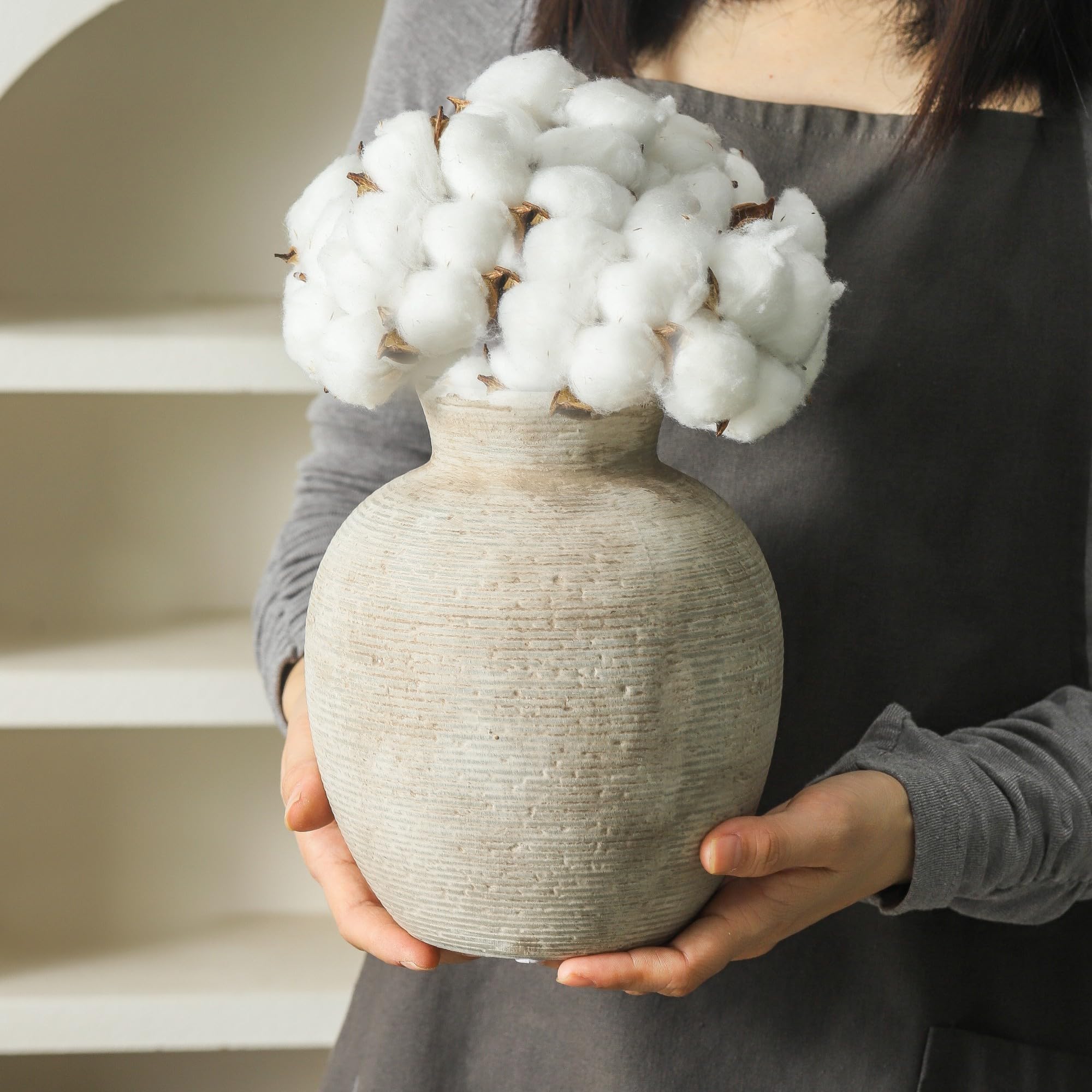 Vanselia ceramic vase with waterproof interior for fresh or faux arrangements.