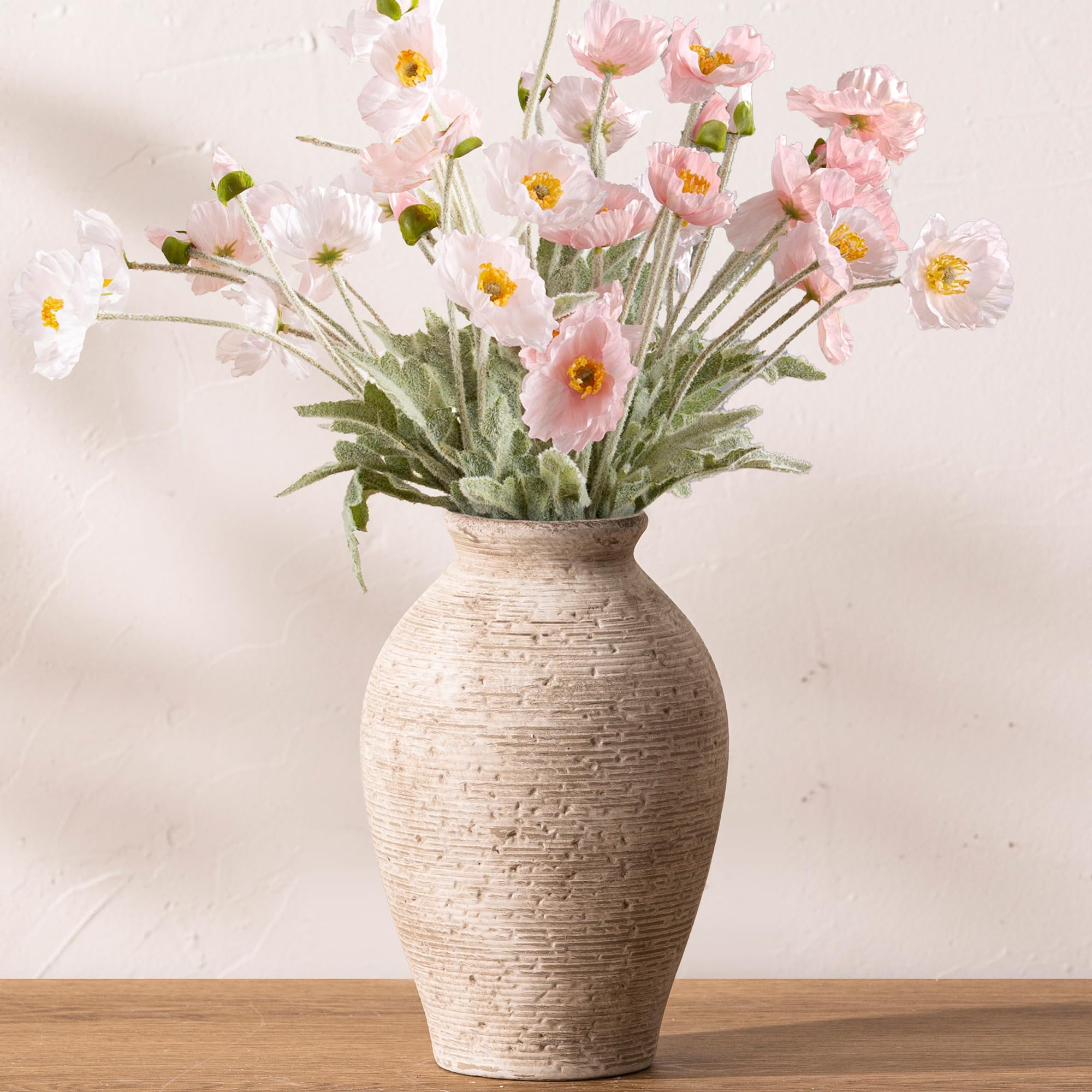 Vanselia waterproof interior vase suitable for fresh stems and dried arrangements.